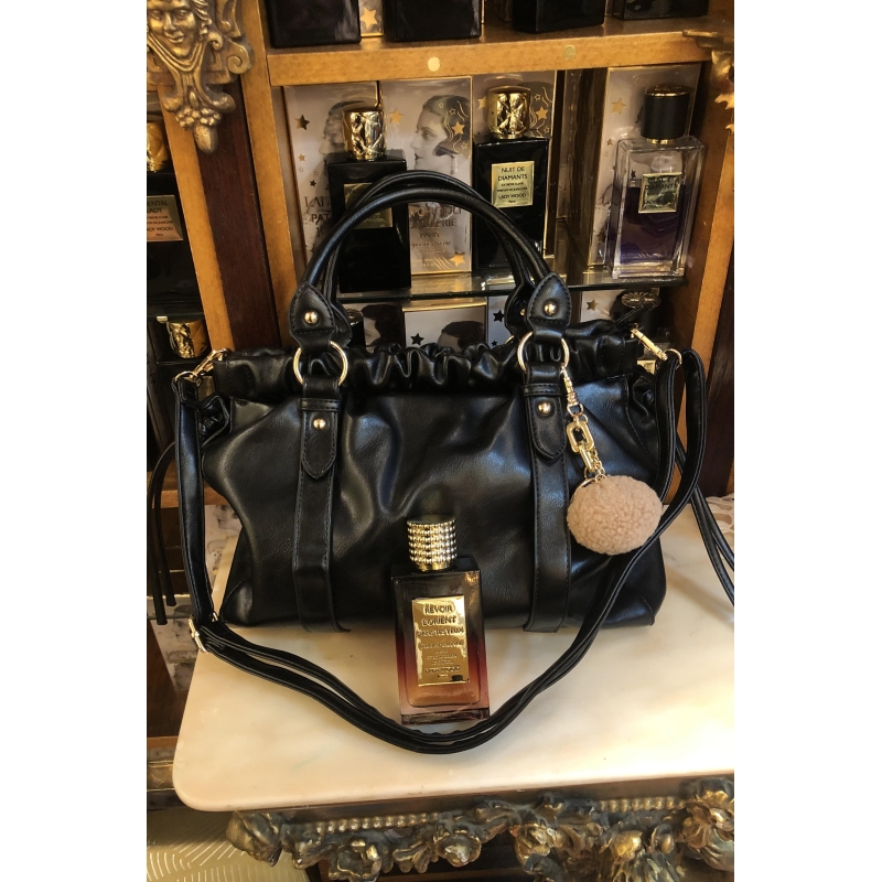 Free handbag with the purchase of 2 perfumes