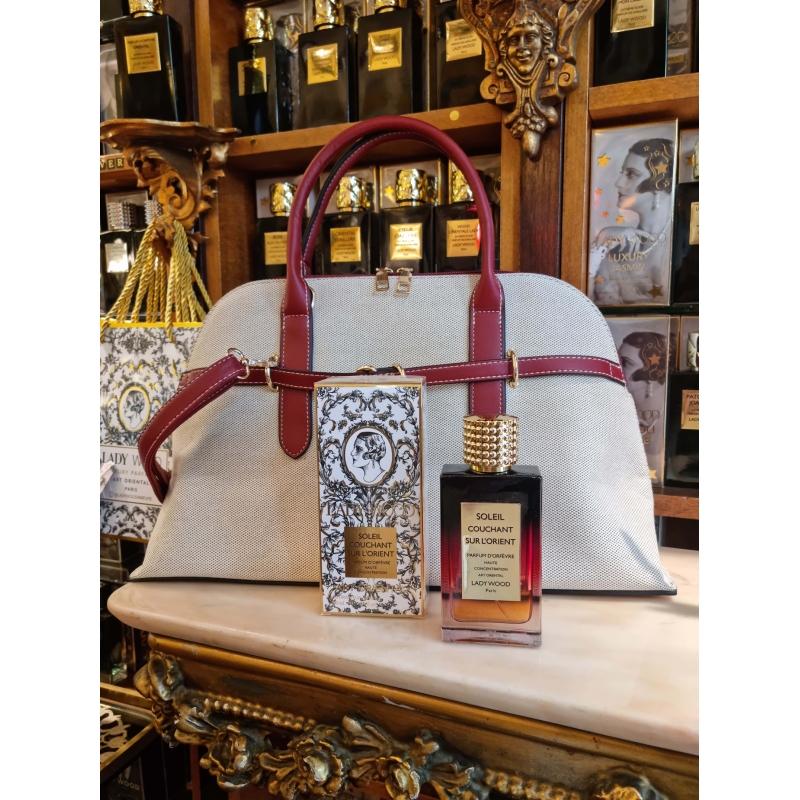 Free handbag with the purchase of 2 perfumes
